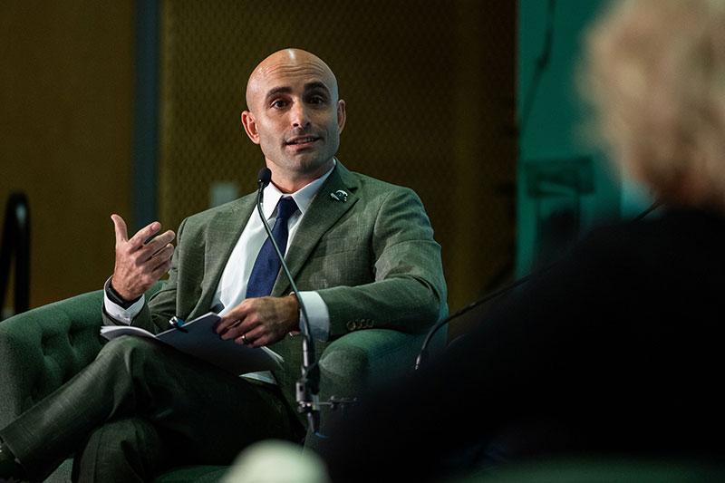 Evan Nicoll moderating Future of Energy Forum session