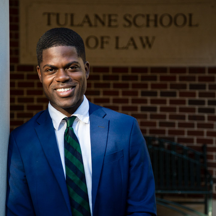 Kwasi Agyeman stands outside Tulane Law School