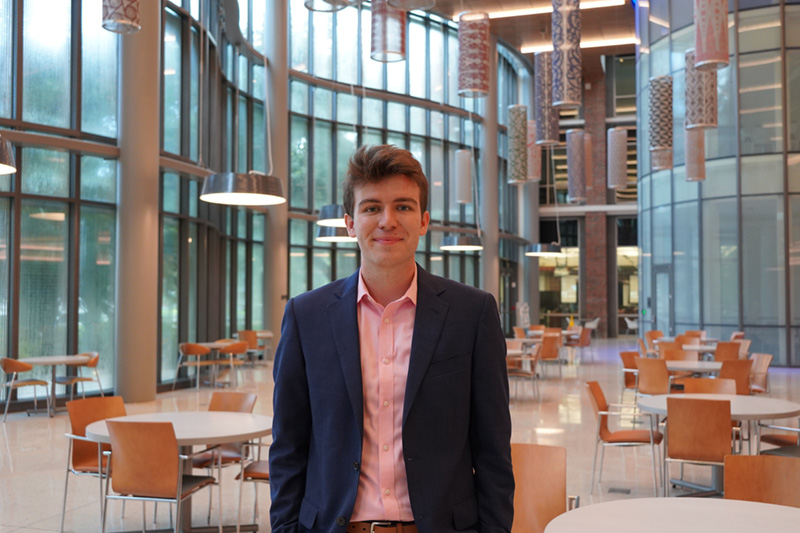 Connor Comeaux photographed in the Marshall Family Commons