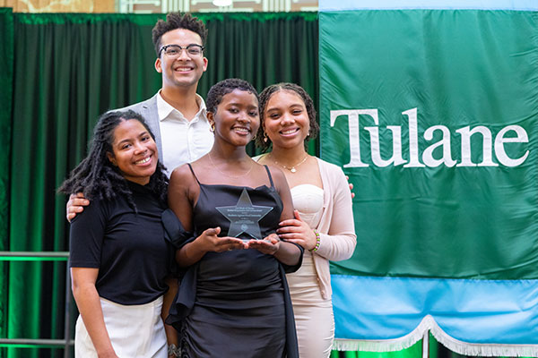 Students Against Food Insecurity display their Winds of Change Award from the Tulane EDI Awards Ceremony