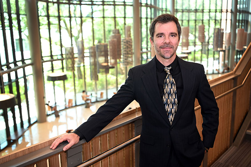 Chris Lipp portrait in Marshall Family Commons of Goldring/Woldenberg Business Complex