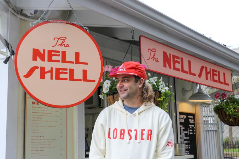 Chris Otten stands in front of the Nell Shell pop-up restaurant. 