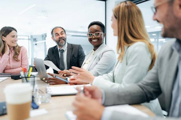 A team of accountants meet in an office.