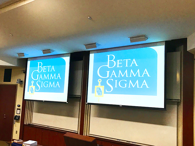 Beta Gamma Sigma logo on classroom screen