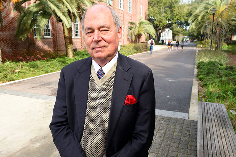 Eric Smith portrait standing on McAlister Place.