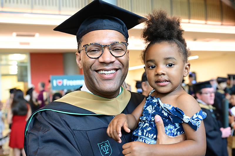 Graduate reception graduate and his daughter