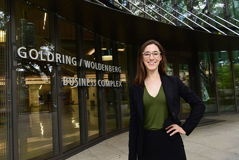 Lisa LaViers photographed in front of the Goldring/Woldenberg Business Complex