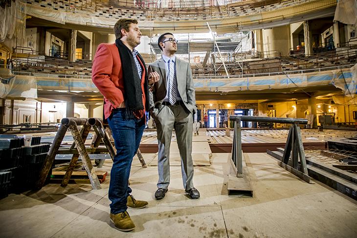 Tulane alumnus Barrett Cooper gives Jason Dunleavy, a sophomore majoring in finance, a tour of the Orpheum Theatre, which is currently undergoing a multimillion-dollar restoration. (Photo by Ryan Rivet)