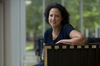 “Working at Tulane while going through the program provides a living laboratory for the material you cover during those three years — it’s not just theory,” says staff member Rhonda Coignet, who earned an MBA from the A. B. Freeman School of Business in 2005. (Photo by Paula Burch-Celentano)