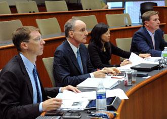 From left to right, Finance Case Competition judges Chris Conoscenti, Chuck Tilis, Claire Liu and Joe Agular.