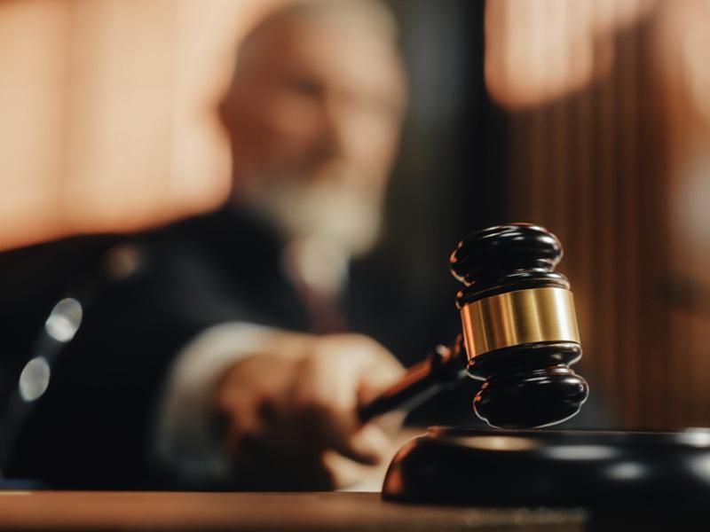 Stock photo of judge banging gavel