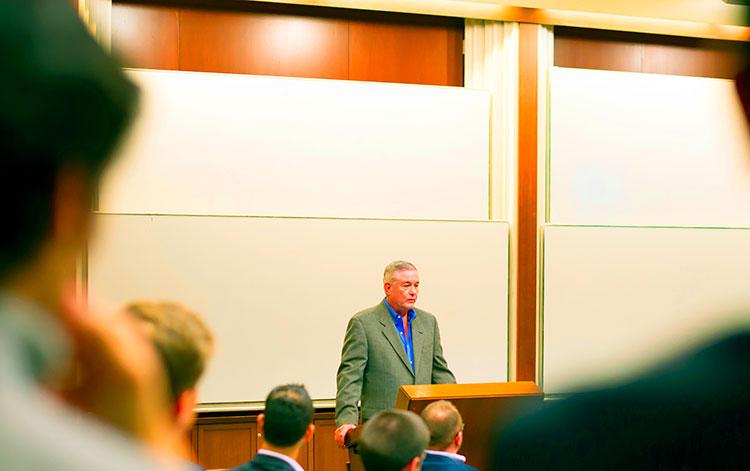 Selber's friend and business partner Dewey Corley spoke about distressed debt at the first meeting of the class.