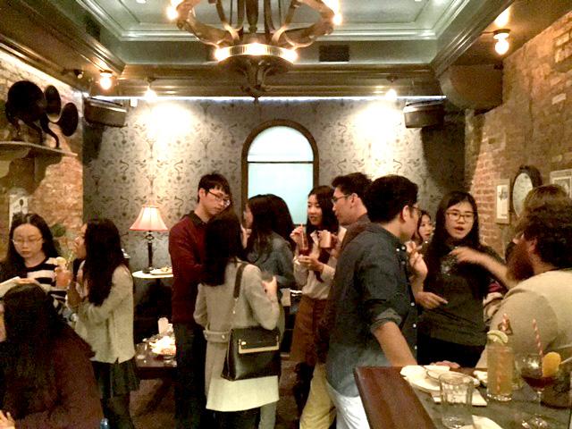 Freeman students network with alumni during a special reception at Hill & Dale in New York.