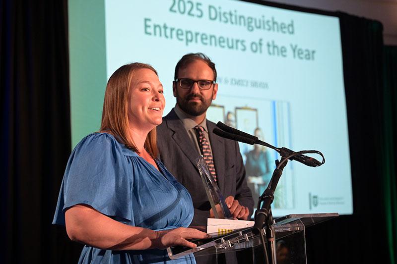 Emily and Alon Shaya accept the 2025 Tulane Disinguished Entrepreneur of the Year Award.