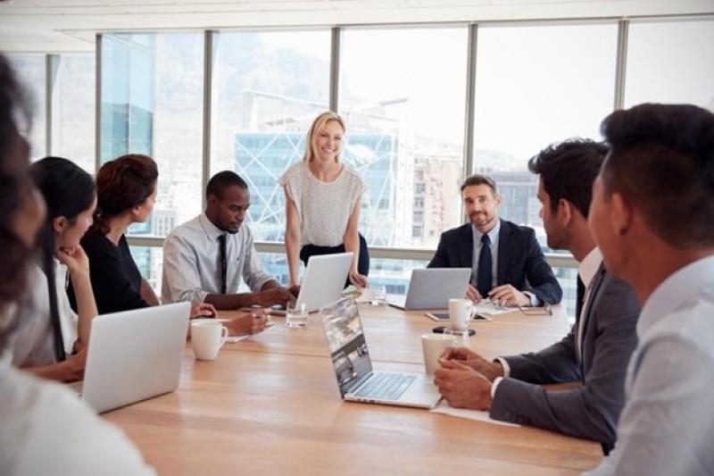Sales Manager speaks to her team