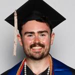 Zachary Fors in cap and gown