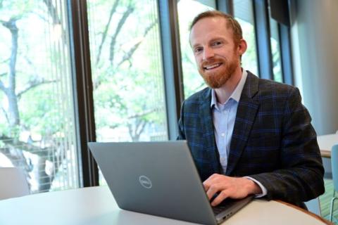 A graduate student apply for scholarships and fellowships. 