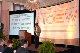  Tulane Business Model Competition finalist Ras Asan, chief operating officer of Million Dollar Scholar, presents to the judging panel at New Orleans Entrepreneur Week. (Photo by Maggy Baccinelli) 