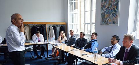 In a classroom on the campus of historic business school ESCP Europe in Paris, adjunct lecturer Alain Dumont leads a discussion with Executive MBA students from the A. B. Freeman School of Business at Tulane University. (Photo by Caryn Lang)