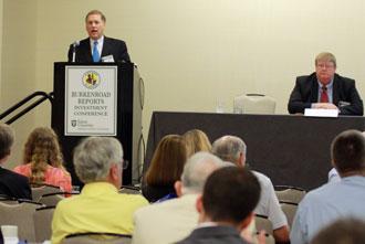 E. V. “Chip Bonner, executive vice president of Susser Holdings, speaks at last Friday's Burkenroad Reports Investment Conference. Photo by Stephen Daigle.