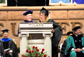 Master of Finance grad Zemin Zhu gives a shout out to friends and family.