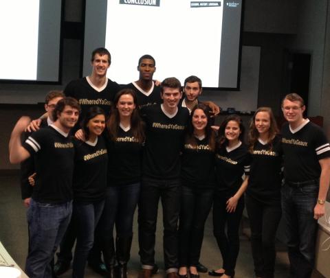 Winning team members show of their #WheredYaGo T-shirts.