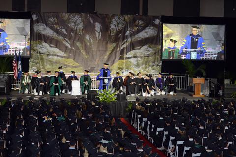 Dean Goes addresses audience at graduation