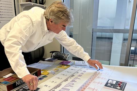 Pierre Conner demonstrates how to play the Energy Transition Game.