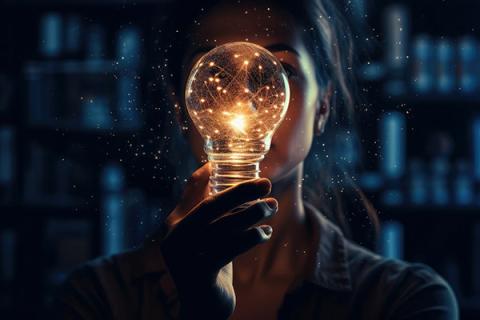 Stock photo of woman with lightbulb