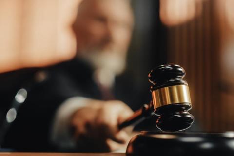 Stock photo of judge banging gavel