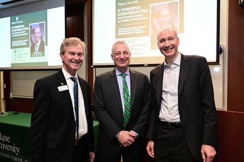 Pierre Conner, Robin Forman and David Turk pose together for a photo in a Tulane classroom.