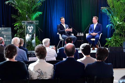 Todd Schwartz delivers the 2024 R.W. Freeman Lecture on stage in the Goldring/Woldenberg Business Complex with interlocutor Myke Yest