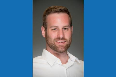 Joe Mulford head shot with blue borders