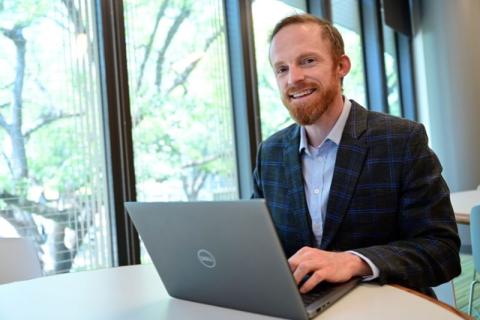 A graduate student apply for scholarships and fellowships. 