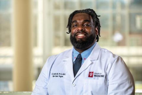 Russell Ledet in a doctor's coat. 