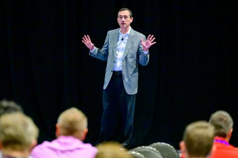 Andy Quick speaking at the 2024 Nuclear Information Technology Strategic Leadership Conference. 
