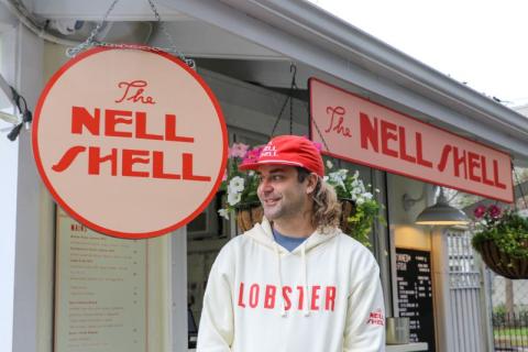 Chris Otten stands in front of the Nell Shell pop-up restaurant. 