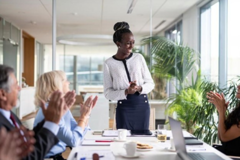 A CEO leads an executive team meeting