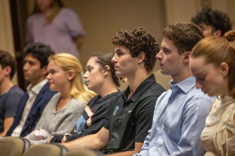 Business students watch Billy Nungesser talk