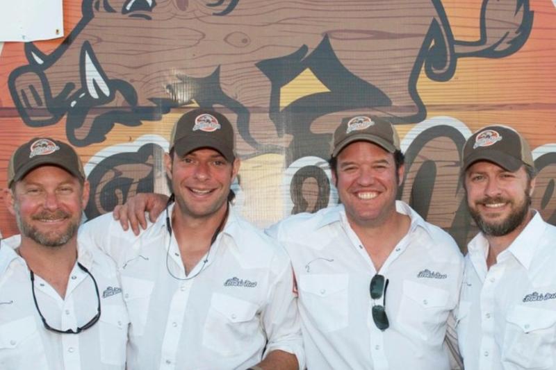 thumbnail for article Alums serve up hogs and hope at annual fundraiser